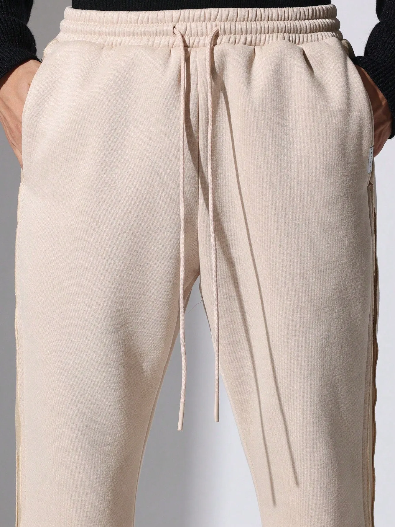 Flare Fit Sweatpants With Contrast Panels And Raw Edge Finishing