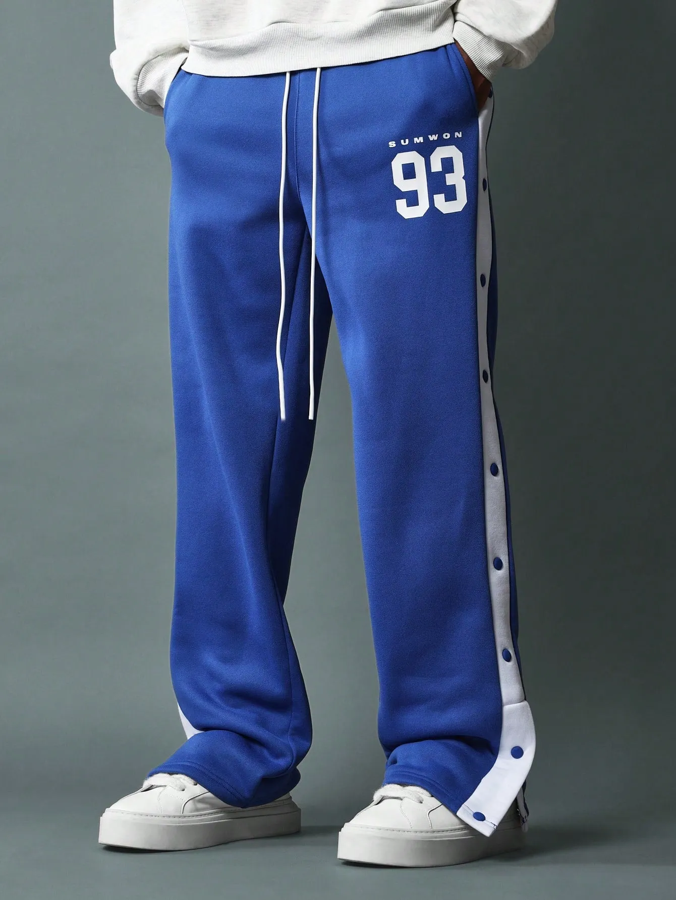 Straight Fit Drop Crotch Sweatpants With Contras Colour Side Panel, Snap Button & Graphic Print