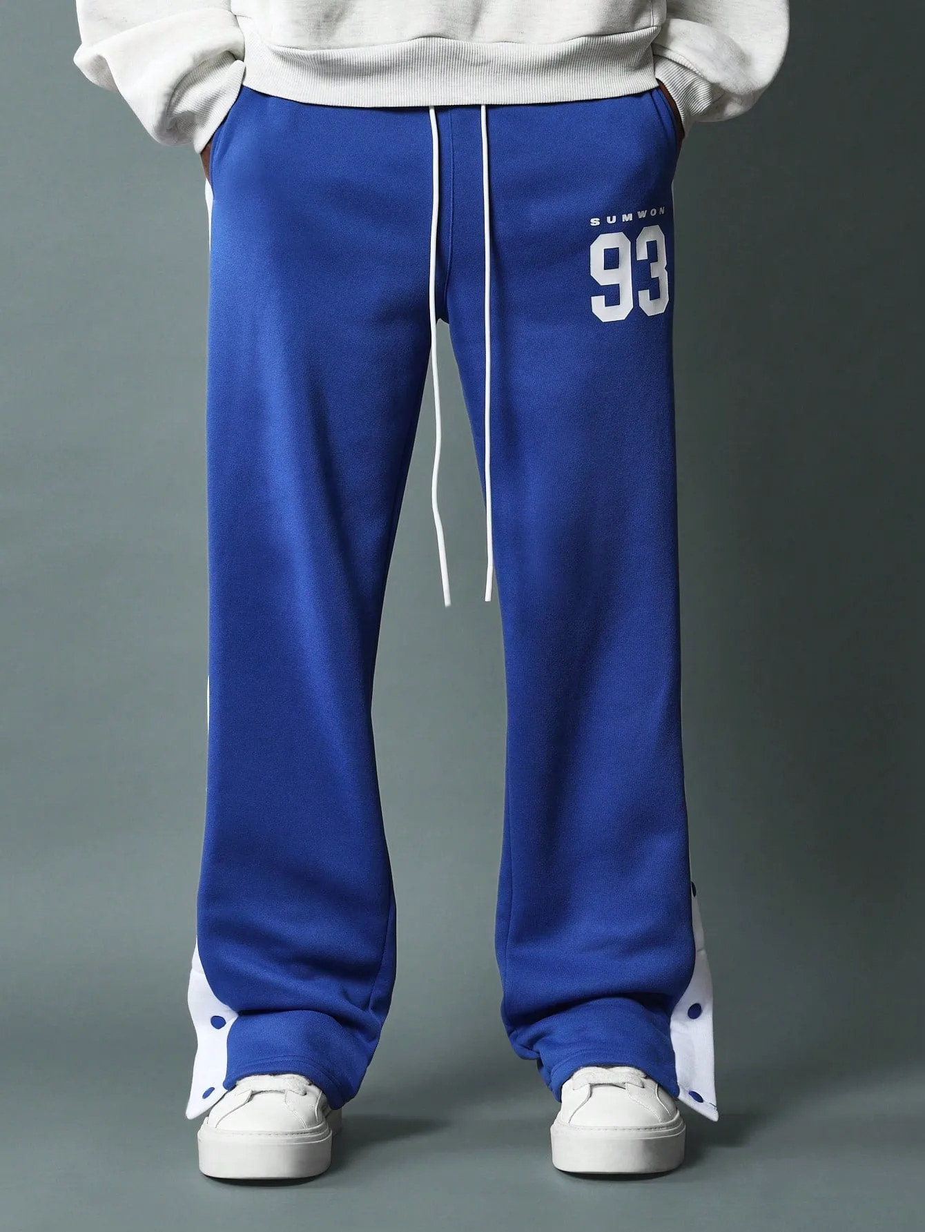 Straight Fit Drop Crotch Sweatpants With Contras Colour Side Panel, Snap Button & Graphic Print