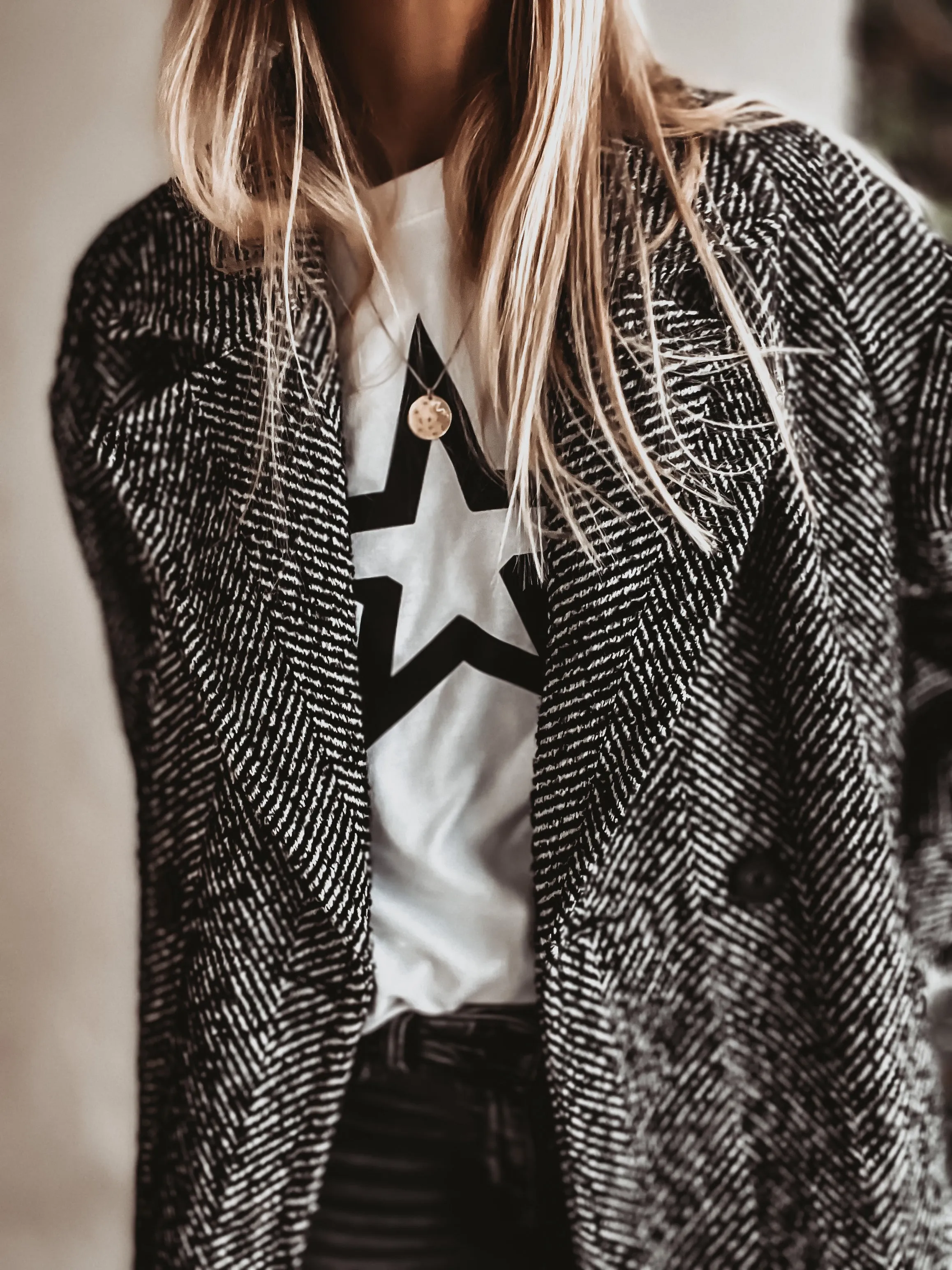 White sweatshirt with a striking black star *boyfriend fit*