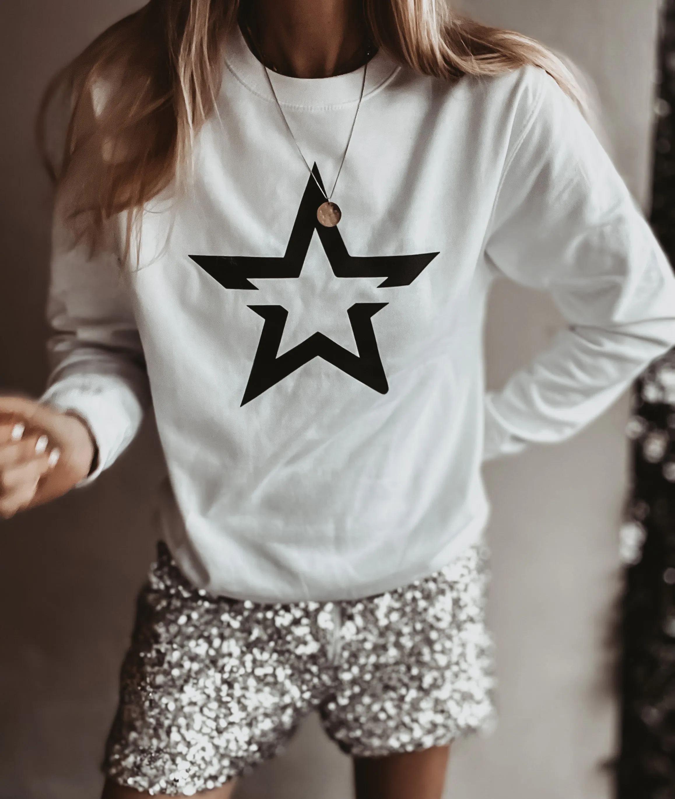 White sweatshirt with a striking black star *boyfriend fit*