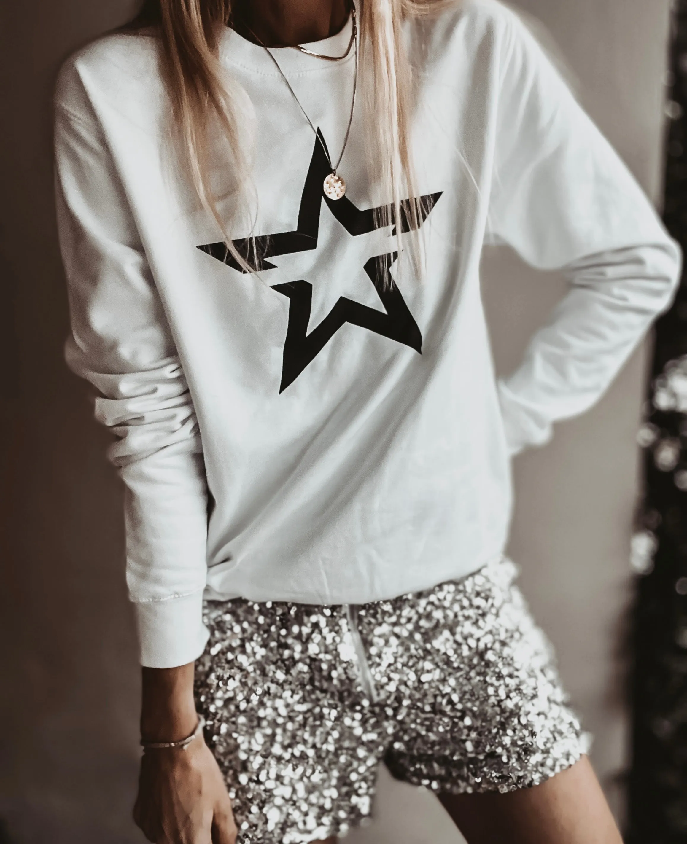 White sweatshirt with a striking black star *boyfriend fit*