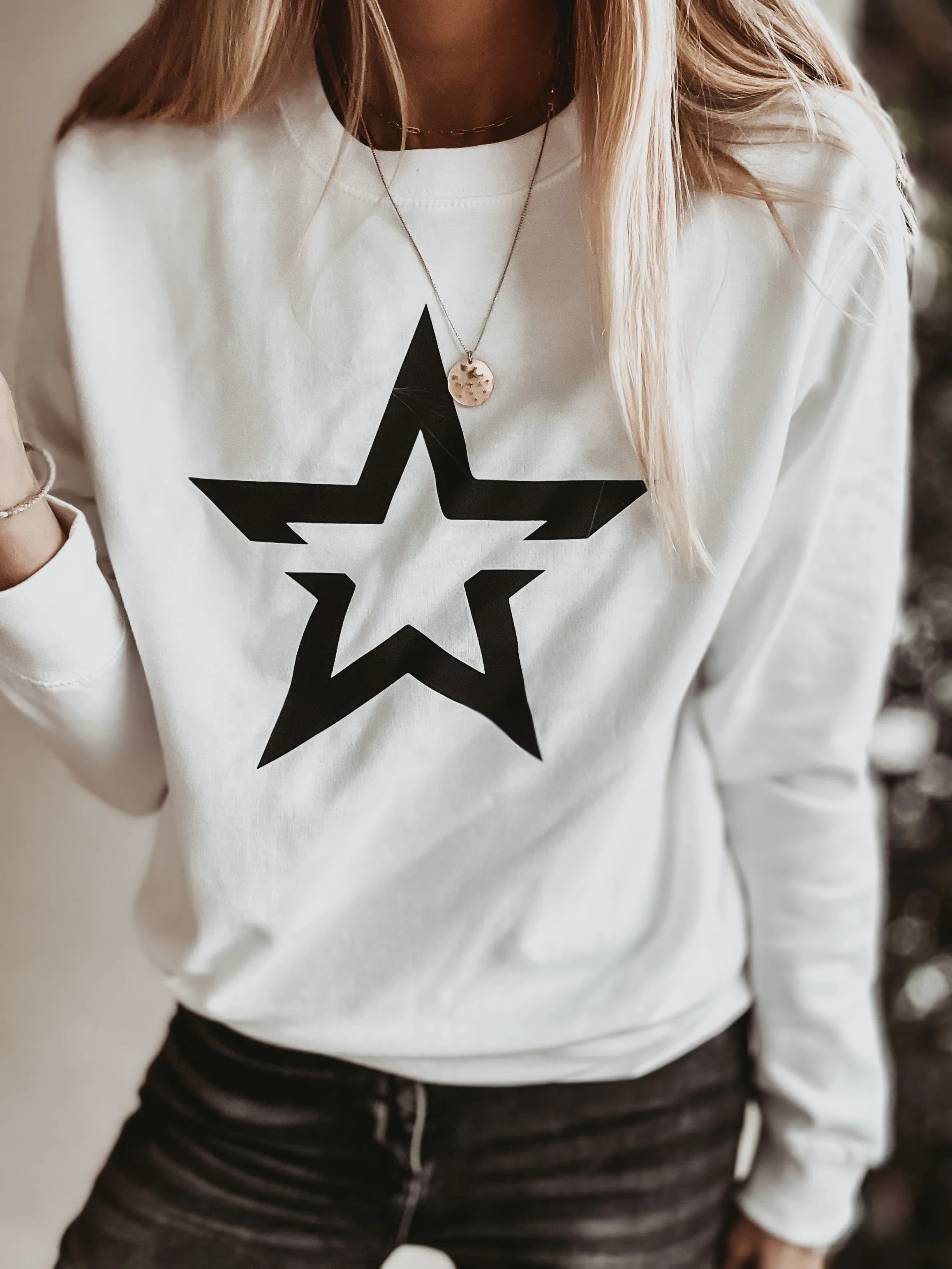 White sweatshirt with a striking black star *boyfriend fit*