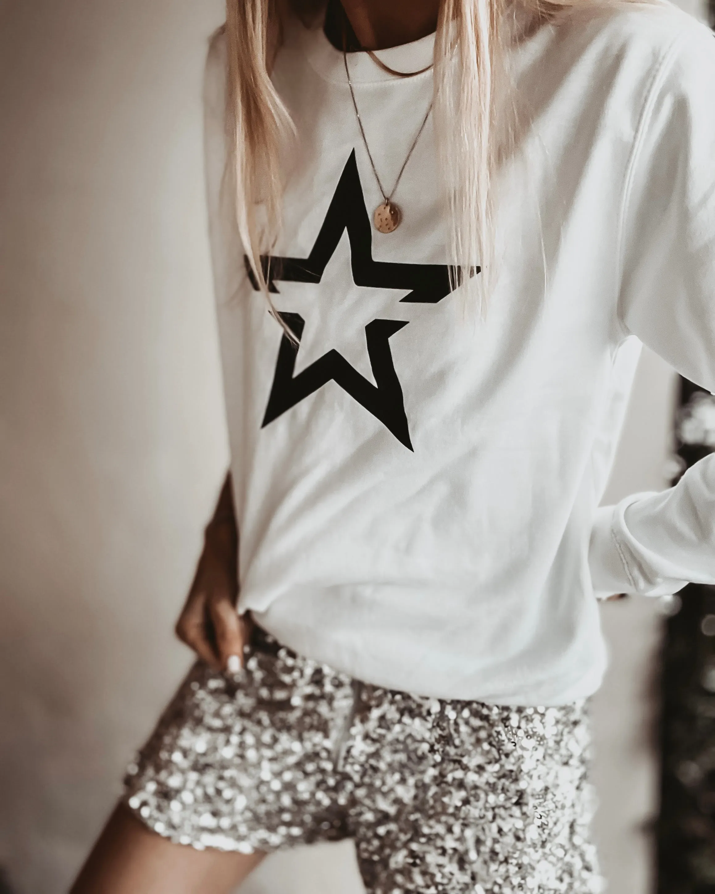 White sweatshirt with a striking black star *boyfriend fit*